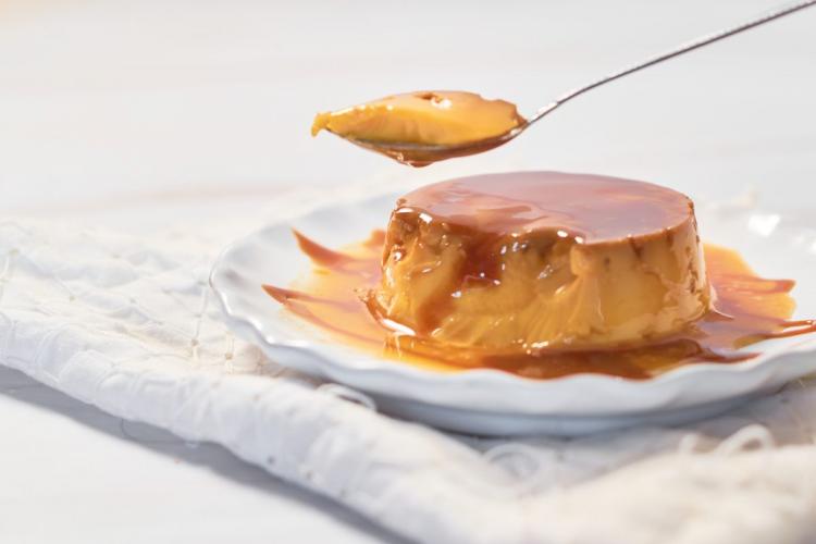 Detail of an individual flan on a plate.