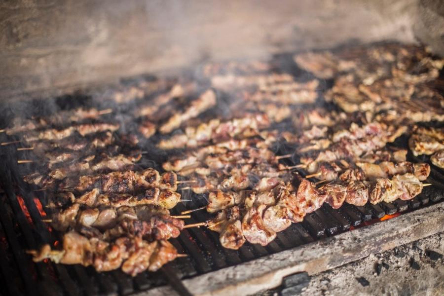 Souvlaki, or lamb kebabs, on the grill.