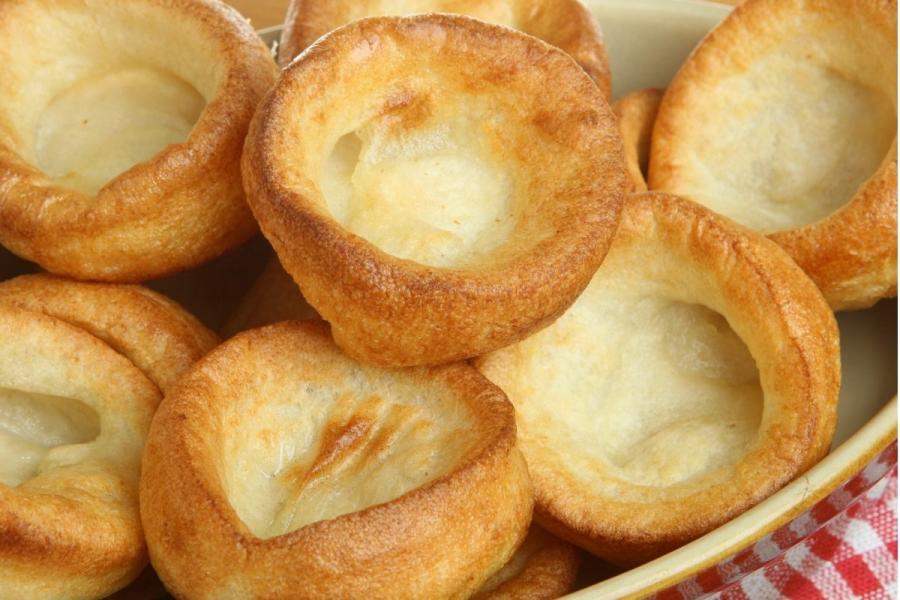 Home cooked Yorkshire puddings on a plate.