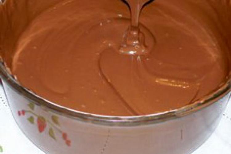Stirring melted chocolate.
