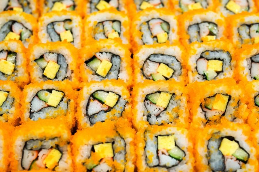 Detail of sushi California rolls.