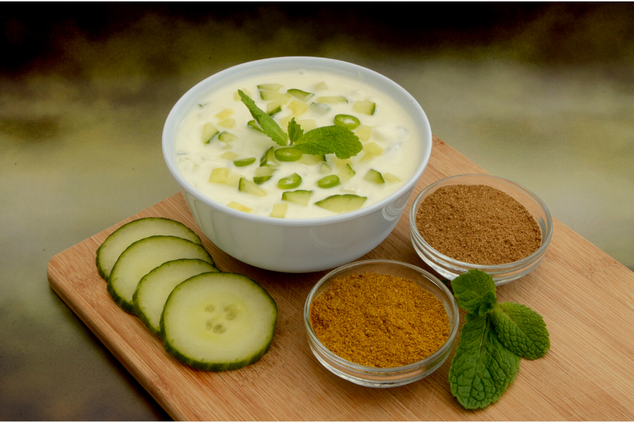 A small bowl of raita, the Indian yogurt sauce.
